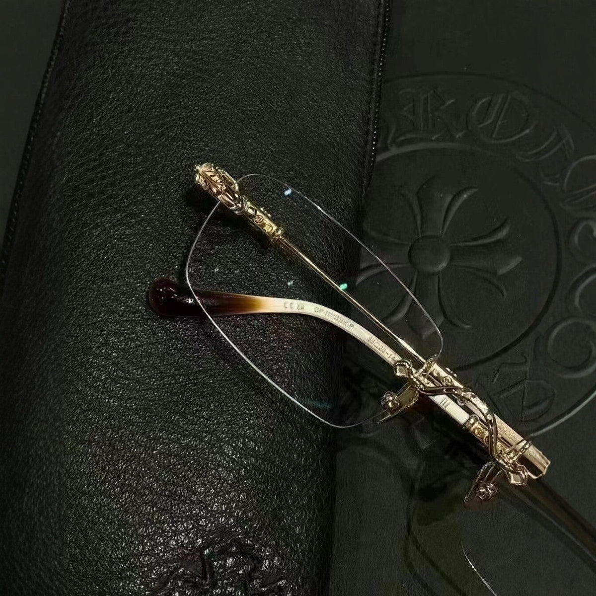 Chrome Hearts Rimless Eyeglass Frames with Cross Engraving